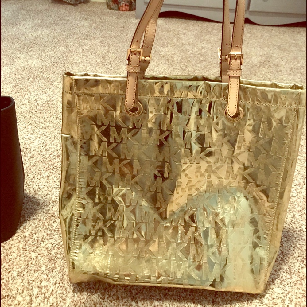 Gold Michael Kors Purse.